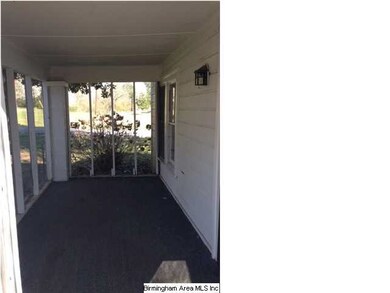 Love the front porch, fully screened too.