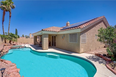 View of pool with a patio area, a fenced backyard,