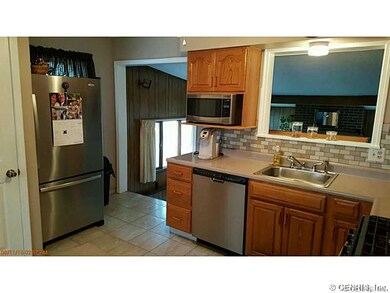 Kitchen. more stainless appliances and entry to fa