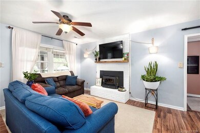 Chill out in the living room with the wood burning fireplace insert.