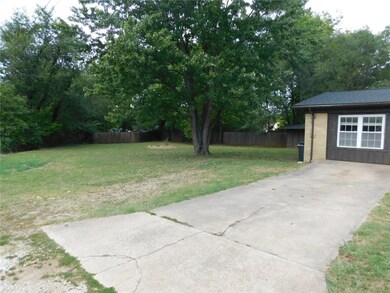Side yard is large and offers lots of possibilities.