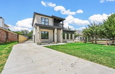 Rear view of house with a yard