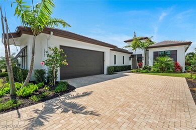 Ranch-style house with stucco siding, an attached