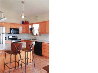 This home has additional seating at the eat-in bar