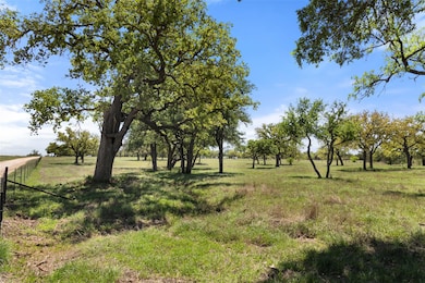 View of yard with a rural view