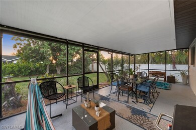 fully screened Lanai with spa and outdoor seating