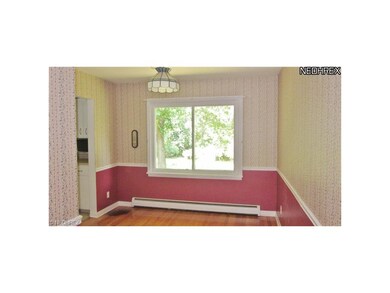 Formal Dining Room with hardwood floor and chair r