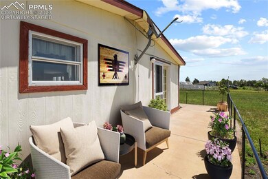 Virtually Staged - Back deck looking at your Pikes