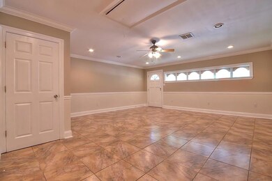 Great Room. Door to utility room on left.