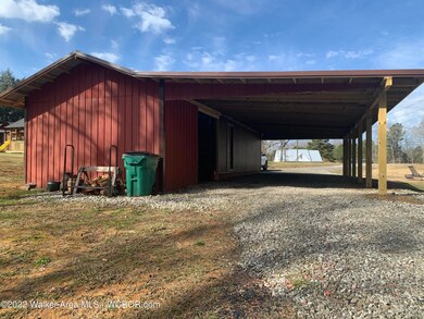detached storage and carport