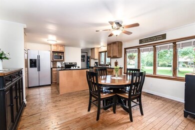 Kitchen and Dining Room combo with hardwood floors