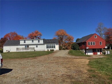 view of both house from the garage...