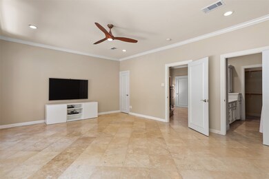 This versatile room can serve as either a large be