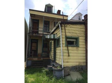 Exterior Back. Back of front home.