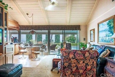 The casual living room area flows directly off fro