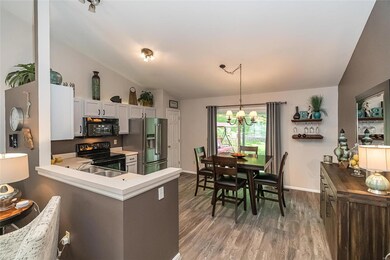 Vaulted Updated kitchen - flooring, light fixtures