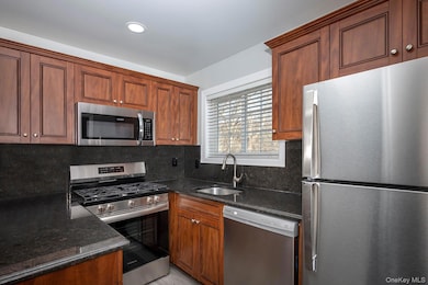 1 Presidents Dr unit 1-4B, Port Jefferson, NY 11777 - photo 2