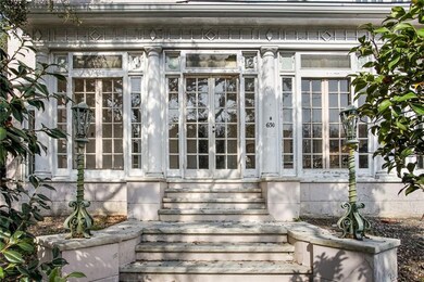 Marble steps are on both the front and side entrie