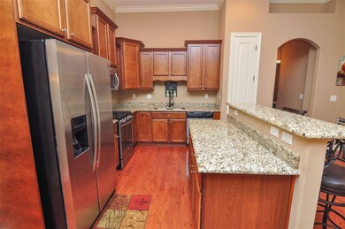 The kitchen comes equipped with stainless steel ap