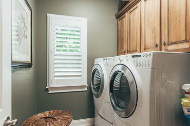 Laundry w/ Custom Cabinets