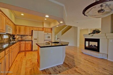 Huge kitchen w/ two sided gas fireplace
