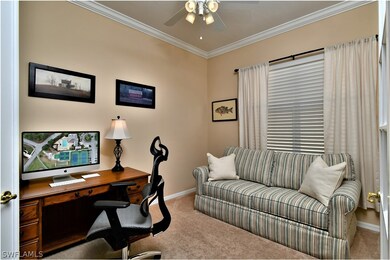 middle bedroom/den with french doors