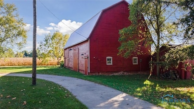 Timber frame barn with concrete floors