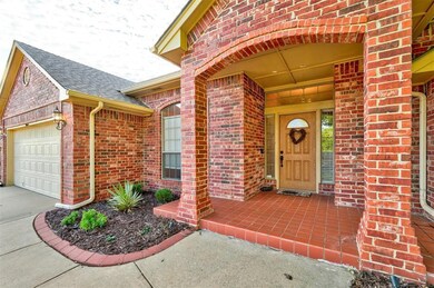 Entrance to property with a garage