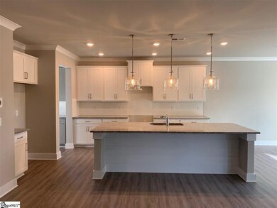 Breakfast nook opens up to enlarged covered back p