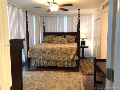 Large Bedroom with wood laminate flooring and ceil