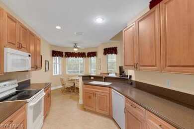 Kitchen featuring sink, white appliances, kitchen 