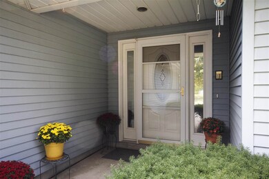 Screen door has roll away screen