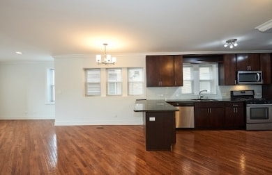 6134 N Washtenaw Ave unit 1R, Chicago, IL 60659 - photo 4