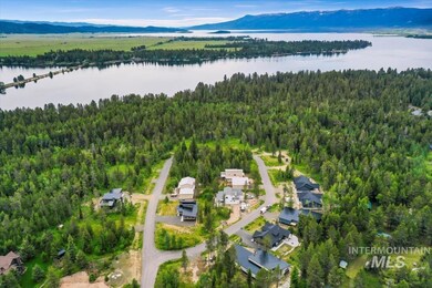 View of property location featuring a water and mountain view