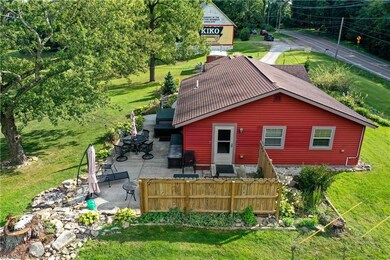 Back of house with a patio and privacy fence