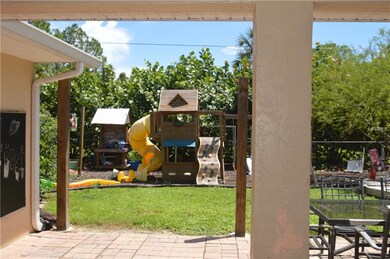 1027 Tropical Ave NW, Port Charlotte, FL 33948 - photo 7