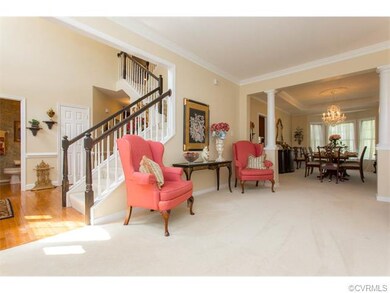 Hardwoods in the foyer & Open to the Dining Room