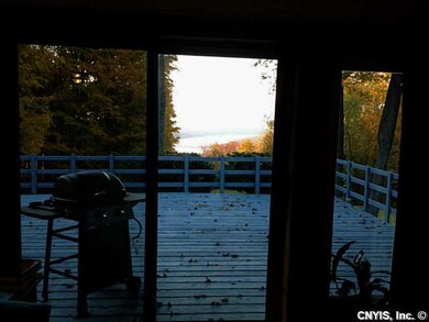 Deck. Stunning view of the lake and sunset from th
