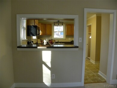 Dining Room Open to Kitchen with Bar Area