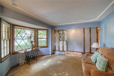 The bow bay window in the living room lets lots of