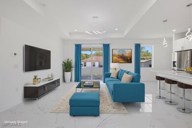 Living area with marble finish floor, plenty of na