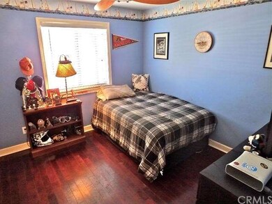 Child bedroom with wood flooring