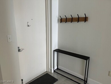 Doorway with tile patterned floors