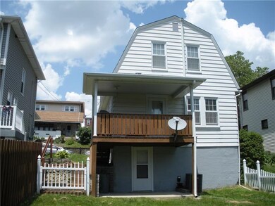 Nice deck in back, concrete patio underneath