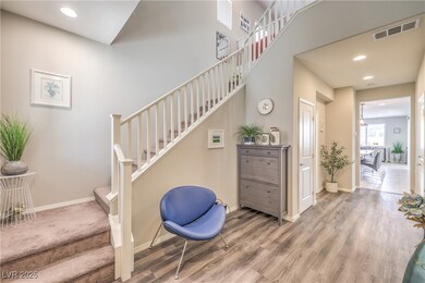 Staircase featuring recessed lighting, wood finish