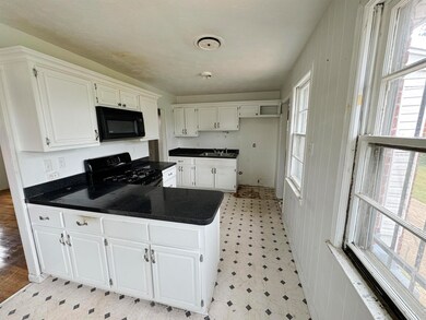 Kitchen featuring a healthy amount of sunlight, bl