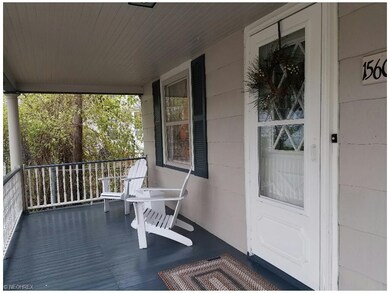 Big front porch to sit a while and watch the world go by!