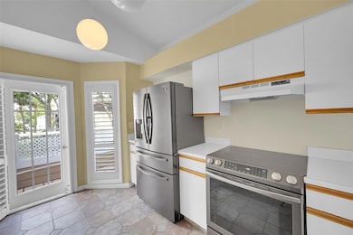 Kitchen with balcony access