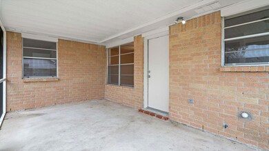 escape the mosquitos in this screened patio!