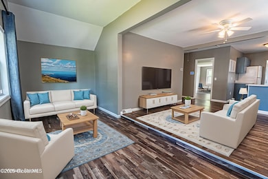 Dining area/living room virtually staged
